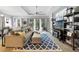 Bright living room with a large sectional sofa and a view of the patio at 220 Asterbrooke Dr, Deland, FL 32724