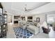 Open floor plan living room with view of the modern kitchen at 220 Asterbrooke Dr, Deland, FL 32724