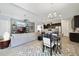 Open concept living room and kitchen area with modern furnishings at 220 Asterbrooke Dr, Deland, FL 32724