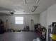 Functional garage space featuring a window for natural light and ample room for storage and projects at 2204 Poinsettia Dr, Deland, FL 32724