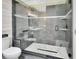 Modern bathroom featuring a glass shower with gray tile surround and pebble floor at 2329 River Ridge Rd # 4, Deland, FL 32720