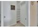 Walk-in closet with plenty of shelving at 2329 River Ridge Rd # 4, Deland, FL 32720