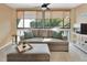 Bright sunroom with comfortable seating and large windows providing lots of natural light at 2329 River Ridge Rd # 4, Deland, FL 32720