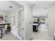 Bright, airy entryway with neutral walls and tile floors leading to an open-concept living space at 2406 Kennington Cv, Deland, FL 32724