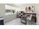 Bright office with modern desk setup, neutral walls, and window views adding a creative and productive touch at 2406 Kennington Cv, Deland, FL 32724