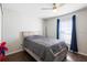 Bedroom with a bed and a window with dark drapes at 2448 Newmark Dr, Deltona, FL 32738