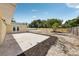 Backyard featuring a new patio, mulch beds, and privacy fence at 2486 Shiprock Ct, Deltona, FL 32738