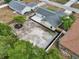 A lovely fenced in backyard with an artistic landscaping feature for a natural peaceful feel at 2486 Shiprock Ct, Deltona, FL 32738