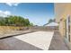 Expansive backyard featuring a concrete patio, lush tree, and new wooden fence at 2486 Shiprock Ct, Deltona, FL 32738
