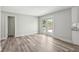 The spacious living area offers backyard access and seamless flow to a well-appointed kitchen at 2486 Shiprock Ct, Deltona, FL 32738