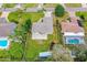 Overhead aerial view of the home, backyard and surrounding neighborhood at 2526 Chester Ave, New Smyrna Beach, FL 32168