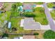 Overhead aerial view of the home, backyard and surrounding neighborhood at 2526 Chester Ave, New Smyrna Beach, FL 32168