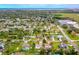 An aerial view of neighborhood with a home marked with an arrow at 2526 Chester Ave, New Smyrna Beach, FL 32168