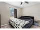 Bedroom with neutral tones and a window allowing natural light to enter at 2526 Chester Ave, New Smyrna Beach, FL 32168