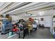 This garage features an epoxy floor, tools, and storage at 2526 Chester Ave, New Smyrna Beach, FL 32168