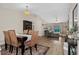 Inviting living and dining room featuring hardwood floors, neutral paint, and an open layout at 2526 Chester Ave, New Smyrna Beach, FL 32168