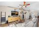 Spacious living room with decoratively mounted deer heads, modern console, and an open floor plan at 2526 Chester Ave, New Smyrna Beach, FL 32168