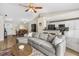 Open-concept living room flowing to the kitchen and dining area, perfect for entertaining guests at 2526 Chester Ave, New Smyrna Beach, FL 32168