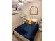 Bedroom featuring a blue bedspread and shelving at 260 Teddy Rushing St, Debary, FL 32713