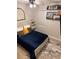 Bedroom featuring a blue bedspread and shelving at 260 Teddy Rushing St, Debary, FL 32713