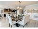 Dining area blends seamlessly with a modern kitchen, creating a cohesive and inviting space at 260 Teddy Rushing St, Debary, FL 32713