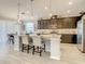Beautiful kitchen with granite countertops, stainless steel appliances and barstool seating at 260 Teddy Rushing St, Debary, FL 32713