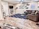 Inviting living room with wood floors, plush furniture, and stylish decor at 260 Teddy Rushing St, Debary, FL 32713