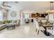 Spacious open floor plan connecting living, dining, and kitchen areas provides ample space for entertaining and Gathering life at 260 Teddy Rushing St, Debary, FL 32713