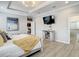 Main bedroom with television and en suite bathroom at 260 Teddy Rushing St, Debary, FL 32713