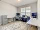 Bright home office with large windows, neutral walls, and ample desk space for two work stations at 260 Teddy Rushing St, Debary, FL 32713