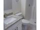 Bathroom features a white vanity with granite top and a white shower at 2709 Sedgefield Ave, Deltona, FL 32725
