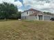Charming home with spacious yard, solar panels, and a two-car garage at 2709 Sedgefield Ave, Deltona, FL 32725