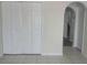 View of interior hallway and bi-fold doors at 2709 Sedgefield Ave, Deltona, FL 32725