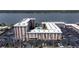 An aerial view of the condo complex showcasing the private pool and ample parking at 2711 N Halifax Ave # 496, Daytona Beach, FL 32118