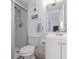 This bathroom has a white vanity, shower, and white walls at 2711 N Halifax Ave # 496, Daytona Beach, FL 32118