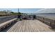 Private dock with seating and amenities offers stunning water views for relaxation and entertainment at 2711 N Halifax Ave # 496, Daytona Beach, FL 32118