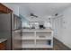 View from the kitchen featuring stainless appliances and open floor plan at 2711 N Halifax Ave # 496, Daytona Beach, FL 32118