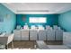 Large laundry room with rows of coin-operated washers at 2711 N Halifax Ave # 496, Daytona Beach, FL 32118