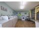 Laundry room featuring multiple washing machines and clothes drying rack at 2711 N Halifax Ave # 496, Daytona Beach, FL 32118