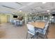 Spacious recreation room with tables, chairs, and ample seating for social gatherings and events at 2711 N Halifax Ave # 496, Daytona Beach, FL 32118