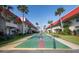 Enjoy the outdoor shuffleboard court surrounded by palm trees at this condominium complex at 2711 N Halifax Ave # 496, Daytona Beach, FL 32118