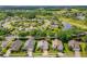 Neighborhood aerial view featuring a lovely home, nearby ponds, and convenient access to surrounding amenities at 276 Gala Cir, Daytona Beach, FL 32124