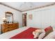 Comfortable bedroom with a closet, a dressing table and a cozy bed at 276 Gala Cir, Daytona Beach, FL 32124