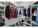 Walk-in closet with ample shelving and hanging space, neatly organized for optimal storage at 276 Gala Cir, Daytona Beach, FL 32124