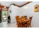 Charming dining area featuring a wooden table with chairs, with access to the front entrance at 276 Gala Cir, Daytona Beach, FL 32124