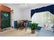 Comfortable living room area featuring a rocking chair, couch, and bright natural light at 276 Gala Cir, Daytona Beach, FL 32124