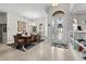 Inviting entryway showcasing a decorative front door, chandelier, and tiled flooring at 2814 S Asciano Ct, New Smyrna Beach, FL 32168