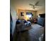 Functional bedroom features carpet, neutral paint, ceiling fan, and one window at 2816 Travelers Palm Dr, Edgewater, FL 32141