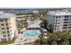 Community featuring a pool, clubhouse, and waterfront views at 3 Riverwalk Dr # 202, New Smyrna Beach, FL 32169
