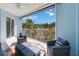 Inviting outdoor patio with seating and views of lush landscaping at 3 Riverwalk Dr # 202, New Smyrna Beach, FL 32169